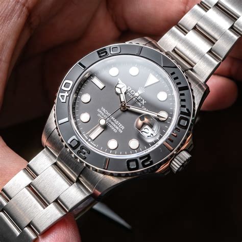 grey and black rolex.